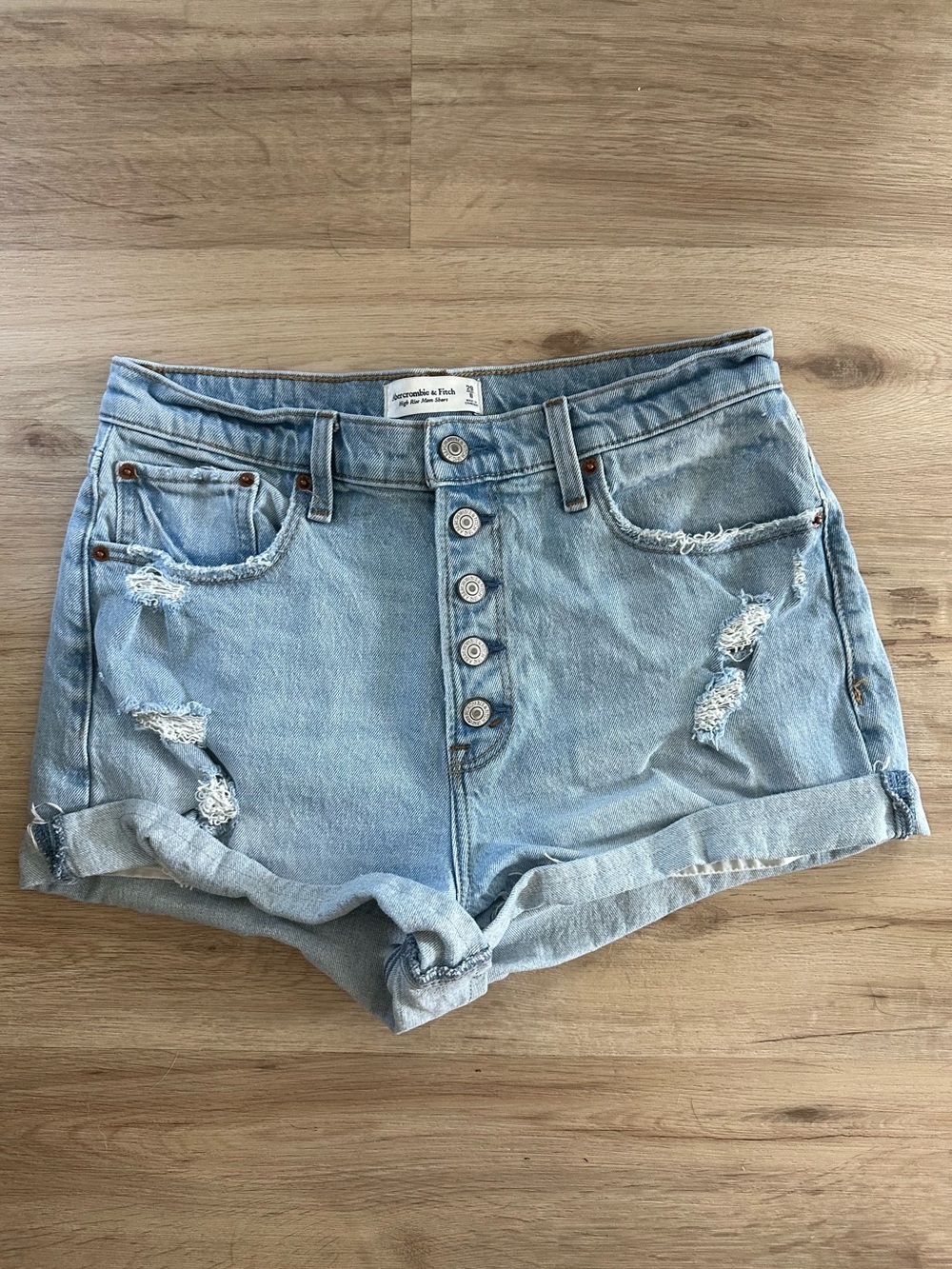 🔹Abercrombie & Fitch High-Waist Distressed Denim Shorts